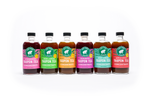 All of the Lost Pines Yaupon tea concentrates. Six glass bottles. Strawberry yaupon tea. Basil Lemon yaupon tea. Peach yaupon tea. Raspberry yaupon tea. Mint Lemon yaupon tea. Apple Spice yaupon tea.