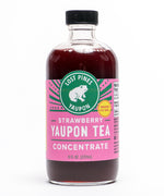 Bottle of Lost Pines Yaupon strawberry yaupon tea concentrate.