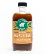 Bottle of Lost Pines Yaupon peach yaupon tea concentrate.