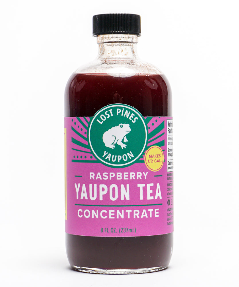 Bottle of Lost Pines Yaupon raspberry yaupon tea concentrate.